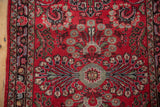 Vintage Dargezine runner: central column of floral bouquets and millefleur vinery on cherry red.