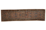 Distressed hand-knotted Lilihan runner rug, soft mauve field, blue floral design, geometric borders.