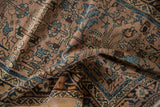 Close-up of distressed Lilihan runner showing textured pile, dusty mauve, navy, and floral vines.