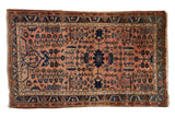 Distressed vintage Persian Lilihan rug fragment, dusty rose field, navy blue floral, vine border. 3'7