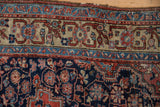 Intricate floral and geometric border patterns of the vintage Northwest Persian rug, with navy, sky blue, blush, and ivory tones.