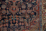 Intricate navy blue, faded blush, sky blue, and ivory floral motifs with border detail.