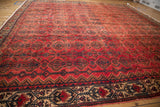 Distressed raspberry red vintage Borchalou pile with vibrant gem-like tones and abrashes.