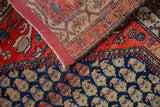 The hand-knotted foundation and secured side of a vintage Persian Malayer rug.