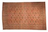 Vintage distressed hand knotted Bokhara carpet with allover geometric gul motifs, dusty rose, coffee brown, silver. 7'7