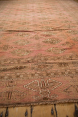 Distressed vintage Bokhara carpet showcasing soft pile, elephant footprint guls, and abrashed tones.