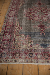 Abrashed field and distressed texture of vintage Turkish Sparta rug with cherry red and ivory.