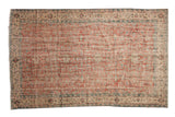 Distressed Vintage Oushak carpet in faded cherry red, ivory, and seafoam green allover pattern, 5'1