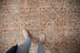 Vividly textured distressed vintage Sparta rug featuring terracotta and sky blue details.
