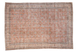 Distressed hand-knotted Turkish Sparta carpet with dusty terracotta floral vinery.