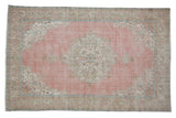 Vintage Distressed Sparta carpet, faded pink medallion, scrolling floral arabesques in green, blue, ivory. 6'11