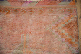 Distressed Kurd runner pile with nuanced pink, tangerine, and silver abrashes.