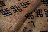 Distressed hand knotted Kurd runner pile, showing navy geometric motifs and varied texture.