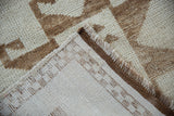 Corner detail of a vintage Kurd rug showing the hand-knotted back and wool pile.