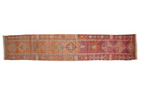 Distressed Kurd runner with primitive diamond motifs, faded orange and dusty rose, 2'8