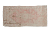 Distressed pink and ivory Oushak runner with faded geometric and floral patterns, 2'7
