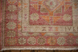 Distressed Kurd runner border, raspberry, ivory, tangerine geometric motifs, even wear, fringe.
