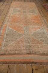 Geometric distressed Kurd runner texture in saffron, tangerine, and silver.