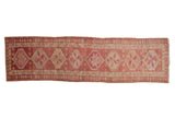 Vintage hand-knotted Kurd runner, distressed geometric medallions, pale raspberry, ivory colors.