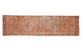 Tangerine orange distressed Kurd runner rug with starburst pomegranate design, 3'1