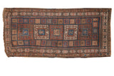 Antique Kurdish runner rug with rust, sky blue, and ivory geometric checkered box pattern.