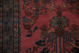 Raspberry red field with floral motifs meeting the denim blue mir serbend border.