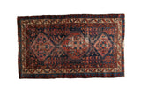 Vintage Fine Mehreban rug with triple medallions, mahi-mahi motifs in worn cobalt blue, ruby red, and ivory, 3'7