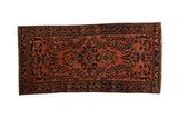 Vintage hand-knotted Persian Lilihan runner, dusty raspberry field, navy floral bouquet.