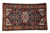 Hand-knotted vintage Persian Borchalou rug, navy Herati field, ivory medallion.