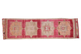 Vintage Distressed Kurd runner rug, vibrant fuchsia frames faded geometric beige medallions, 2'10