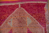 Distressed Kurd rug pile texture with primitive drawing relief, raspberry, and ivory tones.