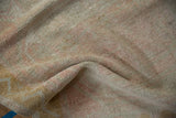 Soft, distressed texture and even wear on a vintage hand-knotted Oushak rug runner.