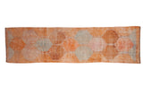 Distressed vintage Kurd runner, tangerine, slate blue, and pink lattice panels, 3'1