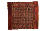 Antique Fine Turkmen square rug with geometric guls in madder red, navy blue, and ivory.
