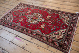 Original side cord selvage and dark brown meandering border of the Dargezine rug.