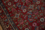 Geometric Herati pattern, cherry red, sky blue, and pink abrashes on a vintage Kurdish Hamadan rug.