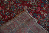 Hand-knotted foundation revealed with the Herati pattern on this vintage Hamadan rug.