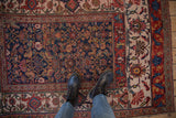 Navy Herati field with ornate turtle Samovar and arabesque borders on antique Bijar rug.