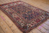 Intricate turtle Samovar border and ornate arabesque outer border on antique Bijar rug.