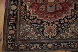 Fine Farahan Sarouk rug with delicate vinery and navy, ruby, ivory spandrel.