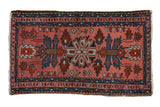 Hand-knotted Persian vintage Lilihan rug, dusty blush field with central floral medallion and sapphire palmettes.