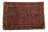 Vintage hand-knotted Lilihan rug mat with brick red floral medallion, Sarouk design, 2x3 foot.
