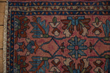 Vintage Mehriban rug border, dusty raspberry field, blue motifs, and natural fringe.