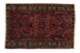 Vintage Borchalou rug with serrated arabesques on a fuchsia field and a beige floral border.