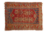 Hand-knotted vintage Anatolian rug; cherry red field, sapphire blue, bird motifs, significant wear.