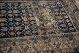 Chichi geometric starburst and serrated border in cobalt blue and beige with visible aged pile.