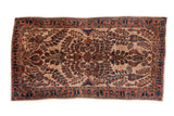 Vintage Mohajeran Sarouk runner with unusual ivory ground and terracotta, navy floral design.