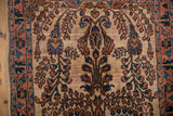 Ivory ground of a vintage Mohajeran Sarouk runner, featuring scrolling terracotta and navy blossoms.