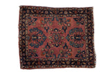Vintage Mohajeran Sarouk rug with dusty mauve field, expressive floral design, navy border.