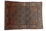 Vintage Malayer rug with sapphire blue Herati field, dusty blush corners, and turtle Samovar border.
